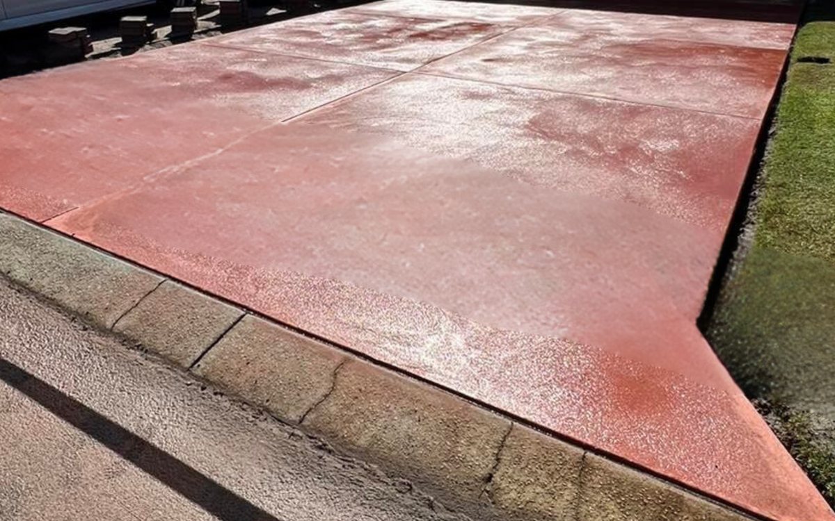 Coloured concrete driveway with full depth oxide pigment
